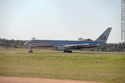 American Airlines near to take of from Carrasco airport - Department of Canelones - URUGUAY. Photo #33247