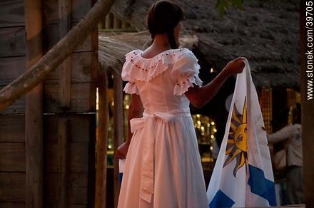 Young woman with the uruguayan flag - Tacuarembo - URUGUAY. Photo #39705