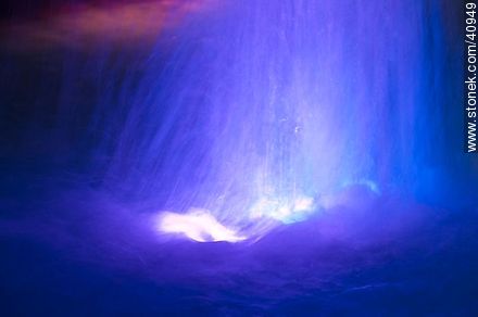 Water fountain illuminated blue -  - MORE IMAGES. Photo #40949