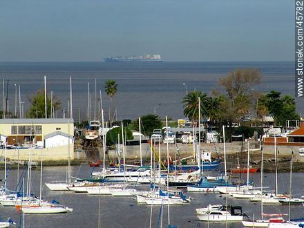 Sailboats and a cargo ship on the horizon - Department of Montevideo - URUGUAY. Photo #45782