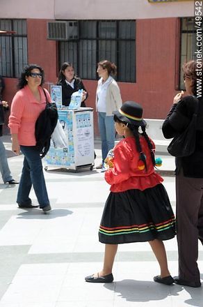 Girl with typical Chilean dress. Avenida Veintiuno de Mayo pedestrian street.  - Chile - Others in SOUTH AMERICA. Photo #49542