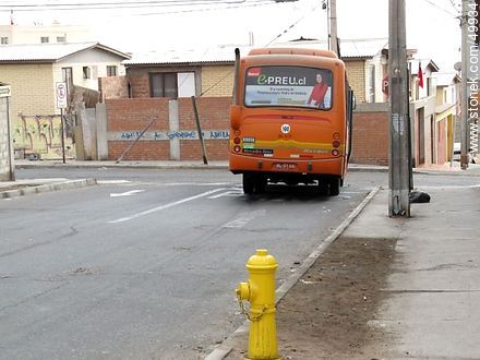 Hydrant and buses on the streets of Arica - Chile - Others in SOUTH AMERICA. Photo #49934