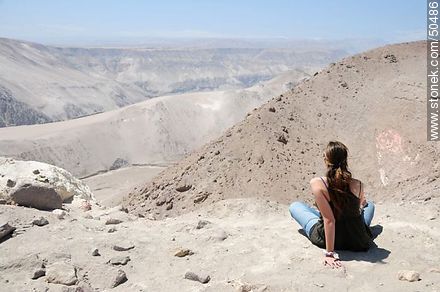 Young woman admiring the scenery of the mountains. Altitude: 1250m - Chile - Others in SOUTH AMERICA. Photo #50486