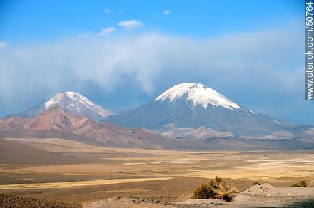 Pomerape and Parinacota volcanoes in the mountains of Nevados de Payachatas - Chile - Others in SOUTH AMERICA. Photo #50764