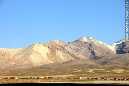 Bolivian trucks waiting to enter Chile. Nevados de Quimaschata - Chile - Others in SOUTH AMERICA. Photo #51717