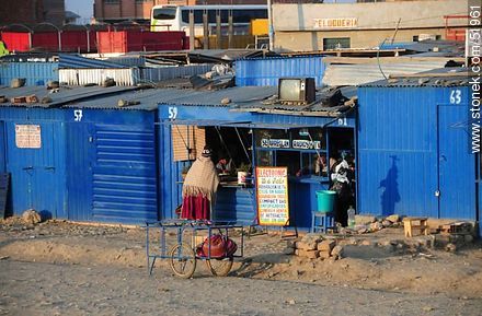 El Alto. Shops painted in blue. - Bolivia - Others in SOUTH AMERICA. Photo #51961
