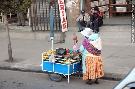 El Alto. Peddler with his son - Bolivia - Others in SOUTH AMERICA. Photo #52023