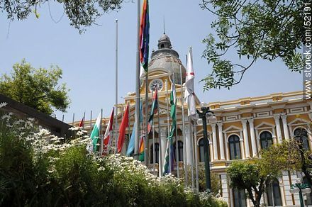 Trujillo flags in the square and the Legislative Palace - Bolivia - Others in SOUTH AMERICA. Photo #52191