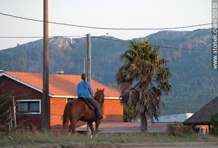 Horsewoman at dawn in Punta Colorada - Department of Maldonado - URUGUAY. Photo #55151