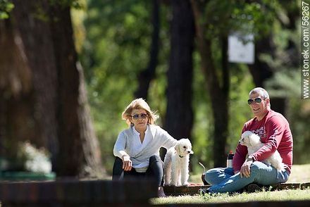 Couple with their dogs - Department of Montevideo - URUGUAY. Photo #56267