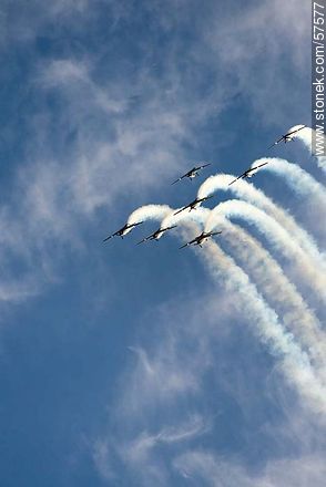 Aerobatics flight formation of the Brazilian Fumaça Escuadrilha Squadron with Embraer EMB 312 Tucano airplanes falling into a tailspin. - Department of Montevideo - URUGUAY. Photo #57577