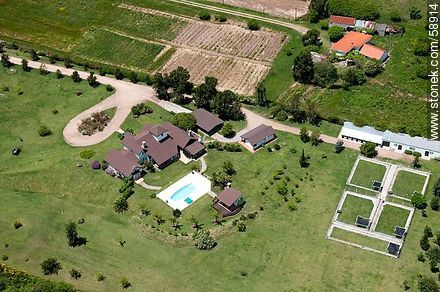Aerial view of a house next to the road Gonzalo Rodriguez - Department of Canelones - URUGUAY. Photo #58914
