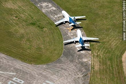 Aerial view of old Pluna Boeing 737 airplanes - Department of Canelones - URUGUAY. Photo #58889