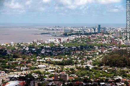 Aerial view of Malvin, Buceo, Pocitos far away - Department of Montevideo - URUGUAY. Photo #59024