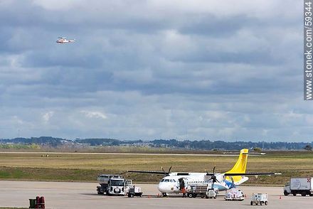 BQB ATR 72 Airplane and Air Force helicopter Bell 212  - Department of Canelones - URUGUAY. Photo #59344