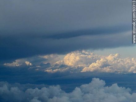 Formation of storm clouds taken from an airplane -  - MORE IMAGES. Photo #63313