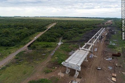 Aerial view of the construction of a new non-submersible bridge on route 30 over the Cuaró Grande River - Artigas - URUGUAY. Photo #66409