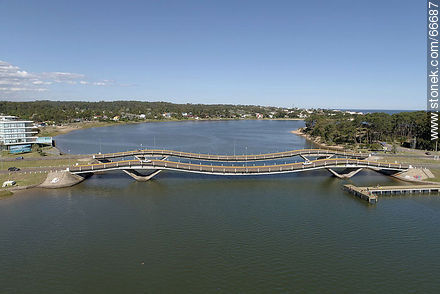 Aerial view of the undulating Leonel Viera bridge over the Maldonado stream - Punta del Este and its near resorts - URUGUAY. Photo #66687