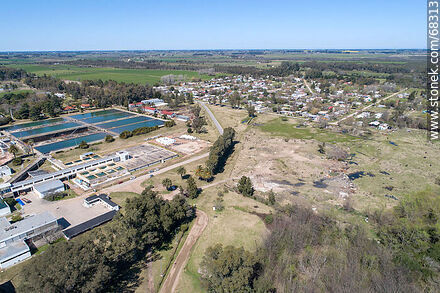 Aerial view of the town and OSE's water treatment plant - Department of Canelones - URUGUAY. Photo #68313