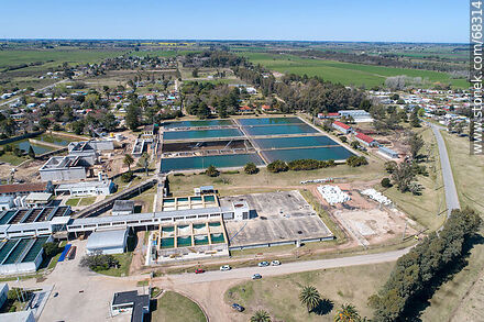 Aerial view of the town and OSE's water treatment plant - Department of Canelones - URUGUAY. Photo #68314