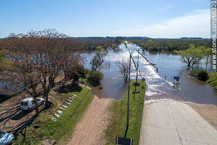 Aerial view of the Santa Lucia River overflowing covering the old Route 11 - Department of Canelones - URUGUAY. Photo #68321