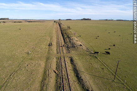 Aerial view of a straight section of railroad to the north at km 329 - Durazno - URUGUAY. Photo #69147