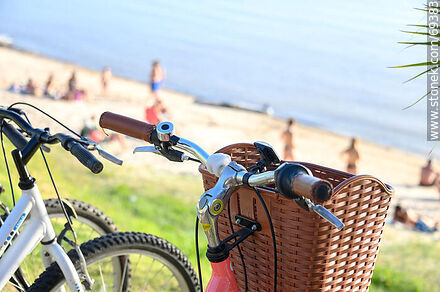 Bicycle basket on the beach -  - MORE IMAGES. Photo #69383