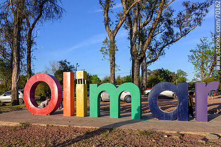 Olimar's lettering poster in front of the river of the same name - Department of Treinta y Tres - URUGUAY. Photo #70162