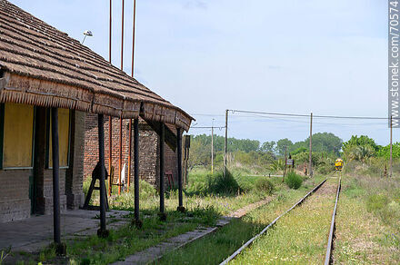 Old railroad station of Montes. A locomotive is approaching - Department of Canelones - URUGUAY. Photo #70574