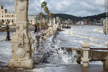 Foam breaking over the sea wall and splashing the promenade - Department of Maldonado - URUGUAY. Photo #71658