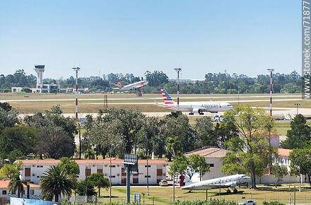 Air Base No. 1, former DC-3 / C-47 on display and Gol plane taking off - Department of Canelones - URUGUAY. Photo #71877
