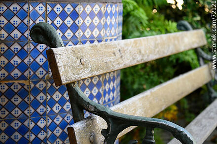 Bench next to a tiled well -  - MORE IMAGES. Photo #72121