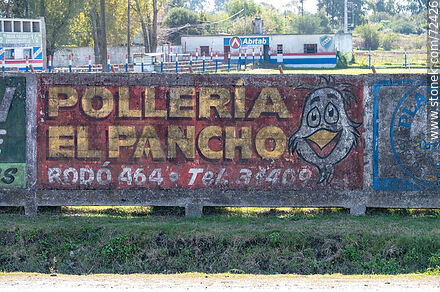 El Pancho poultry store advertisement at Nacional's stadium - Department of Florida - URUGUAY. Photo #72426
