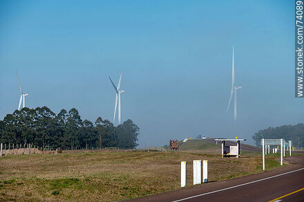 Wind turbines emerging from the morning fog near the Pampa station on Route 5. - Tacuarembo - URUGUAY. Photo #74089