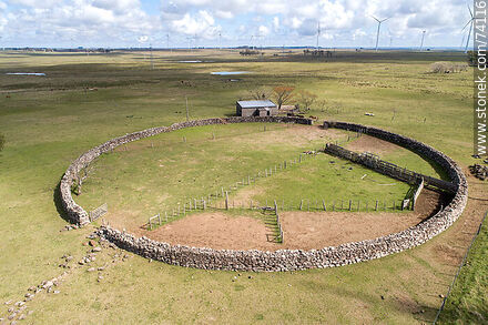 Aerial view of a large old stone fence. Archeological reserve site - Tacuarembo - URUGUAY. Photo #74116