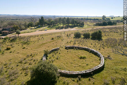 Aerial view of a circular stone fence - Department of Cerro Largo - URUGUAY. Photo #74512