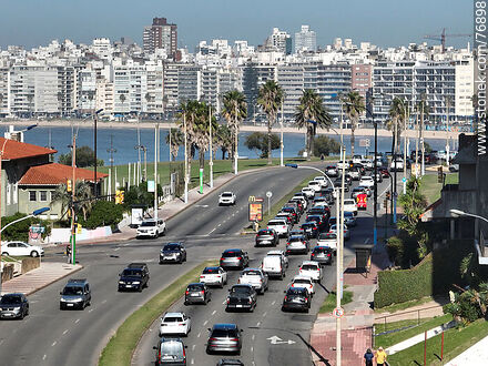 Aerial view of the rambla and L. A. de Herrera Avenue, its morning traffic and the Pocitos beach and rambla - Department of Montevideo - URUGUAY. Photo #76898