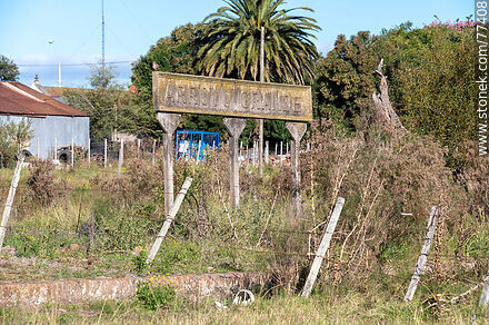Arroyo Grande train station at Ismael Cortinas on the border of four departments. Station sign - Flores - URUGUAY. Photo #77408