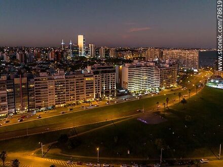 Aerial view of Rambla Rep. del Peru at dusk towards the east. Last glint of sunlight over WTC tower 4. - Department of Montevideo - URUGUAY. Photo #78619