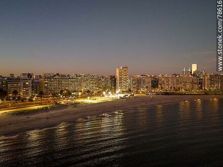 Aerial view of Pocitos beach and its illuminated sports area at dusk - Department of Montevideo - URUGUAY. Photo #78616