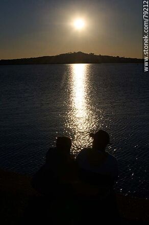 Silhouette of Cerro de Montevideo against the sun - Department of Montevideo - URUGUAY. Photo #79212