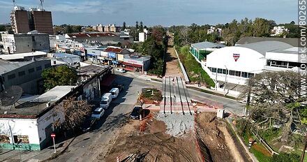 Aerial view of a level crossing over the tracks of the Central Railway at Sayago - Department of Montevideo - URUGUAY. Photo #80265