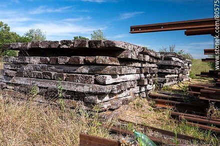 Queguay train station. Old wooden sleepers piled up - Department of Paysandú - URUGUAY. Photo #80575