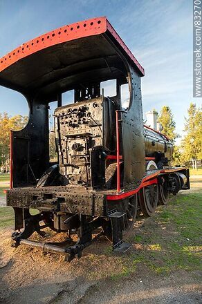 Old locomotive with its wagon for loading firewood or coal in Parque Rodó. - San José - URUGUAY. Photo #83270