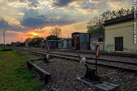 Sun rising behind AFE's stockyards - Department of Salto - URUGUAY. Photo #84278