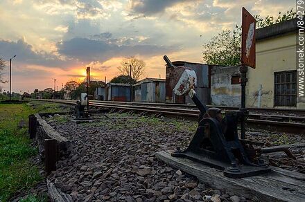 Sun rising behind AFE's stockyards - Department of Salto - URUGUAY. Photo #84279
