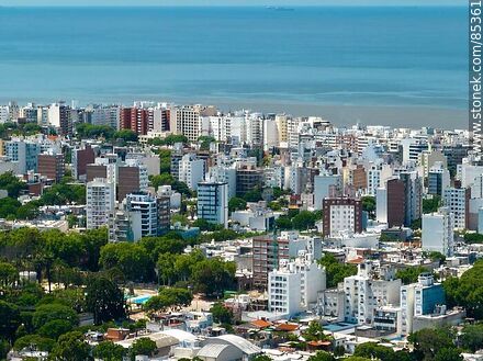Aerial view of buildings in the city of Montevideo with the Rio de la Plata in the background - Department of Montevideo - URUGUAY. Photo #85361