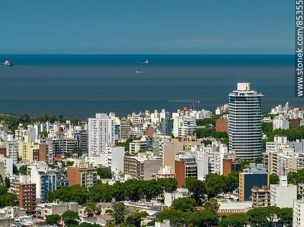 Aerial view of buildings in Montevideo and the Rio de la Plata. Joy Tower on Ponce Street - Department of Montevideo - URUGUAY. Photo #85355