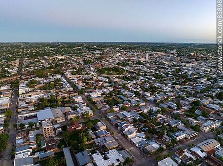 Vista aérea de la ciudad de Paysandú al atardecer - Departamento de Paysandú - URUGUAY. Foto No. 85898
