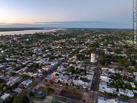 Vista aérea de la ciudad de Paysandú al atardecer - Departamento de Paysandú - URUGUAY. Foto No. 85900